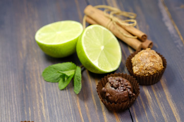 Fresh lime, cinnamon sticks, truffles and mint