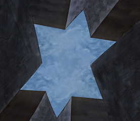 Star of David out of stone with skies above