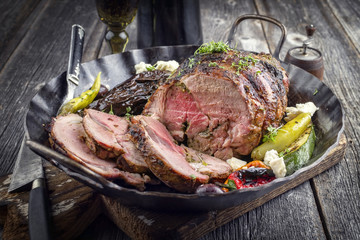 Barbecue Lamb Roast with Vegetable and Feta as close-up in a pan