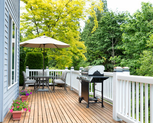 Home deck and patio with outdoor furniture and BBQ cooker - obrazy, fototapety, plakaty