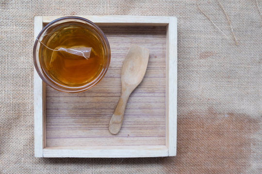 Hot tea on wood tray