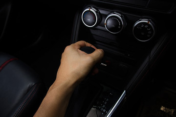 Obraz premium Luxury car Interior - steering wheel, shift lever and dashboard
