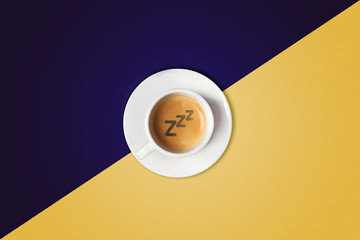 Coffee cup against colorful background. View from above.