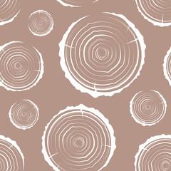 Fototapeta premium Tree Rings seamless. A simple pattern. Saw cut the tree trunk background. cross section of the trunk with tree rings.