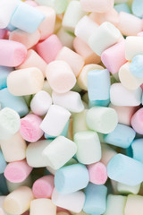 Background or texture of colorful mini marshmallows.