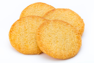 Stacked short pastry cookies isolated on white background.