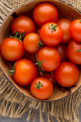 Fototapeta na wymiar Tomato on the gray background.