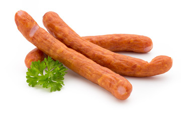 Stack of smoked sausages isolated on a white background.
