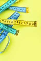 Measure tapes in lemon, turquoise and blue colours