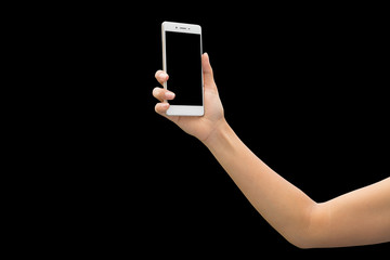 Female right hand holding and touching on mobile smartphone show back side. He is searching something. isolated on black background