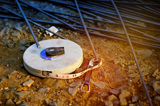 measure tape on ground - Powered by Adobe