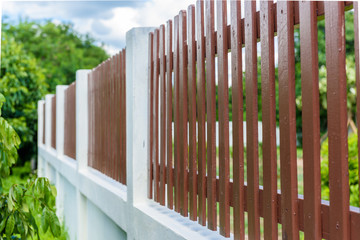 Fototapeta premium wood and metal fence of residential house