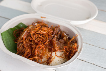 Fried Pork on steamed glutinous rice