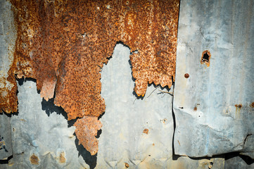 Rusty corrugated metal wall