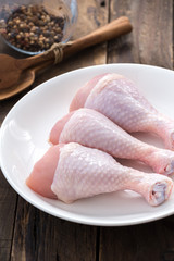 low drumstick chicken on white plate