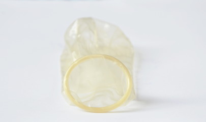 condom protection for safe sex on white background