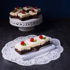 chocolate cream cake with cherries