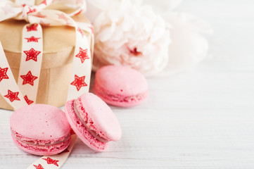 Pink macaroons and kraft gift box