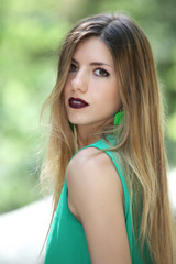 Naklejka premium Outdoors portrait of attractive blonde girl