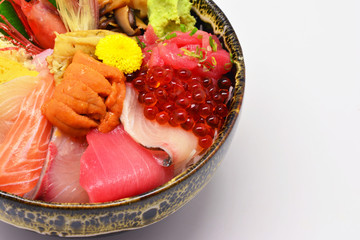 Mixed sashimi , raw and fresh Salmon, tuna, snapper, salmon roe, Uni, japanese eel, wasabi