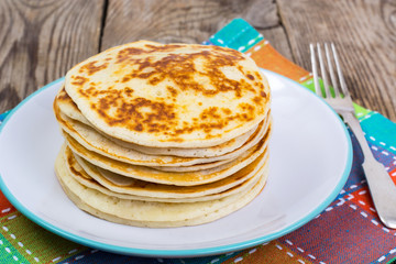 Hot ruddy punkcakes on wooden background
