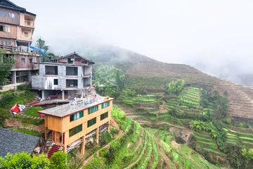 Afwasbaar fotobehang view from Tiantouzhai village terraced rice fields © vvoe