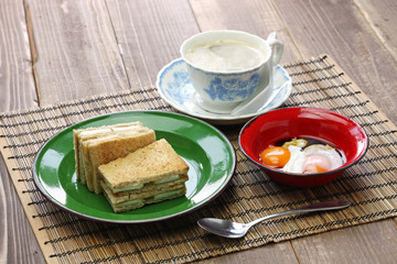kaya jam toast sandwich with a cup of white coffee, singaporean malaysian breakfast