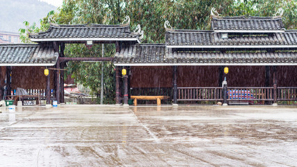 rain over central square in Folk Custom Centre