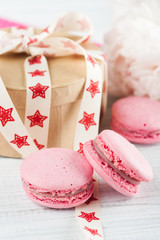 Pink macaroons and kraft gift box