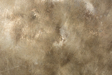 Abstract grungy scratched, metallic background.