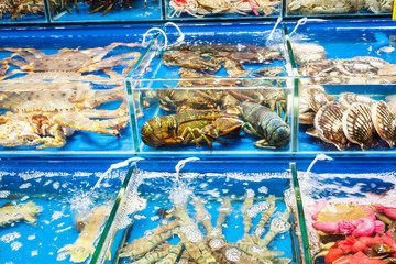 crabs, scallops in fish market in Guangzhou city