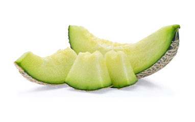 Green cantaloupe melon slices on white background - obrazy, fototapety, plakaty