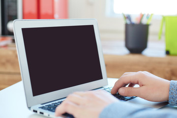 .Young male businessman taking notes on laptop sitting in office. Business, exchange market, job offer, analytics research, excellent education, certified public accountant concept.