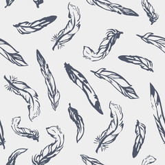 Vector seamless pattern with hand-drawn feathers.