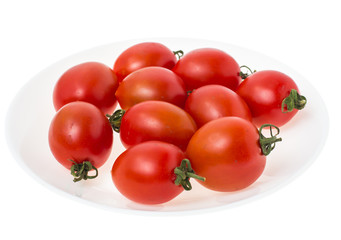 Healthy food: cherry tomatoes on white plate isolated