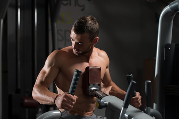 Man Doing Heavy Weight Exercise For Back