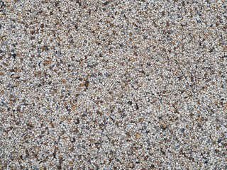 White small pebbles stone in the garden abstract background.