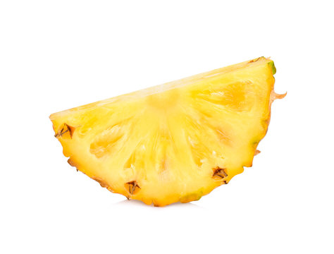 Slice of fresh pineapple fruit isolated on white background