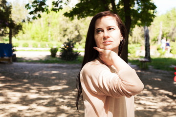 The young girl, the brunette in a pink jacket