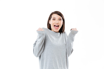 Portrait of a happy excited woman looking at camera