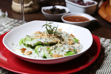 Italian dinner with breads, water and wine, table tidy