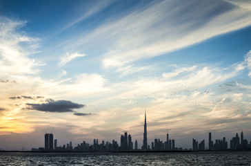 Naklejka na ściany i meble Dubai skyline at Sunset