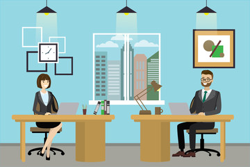 Smiling office workers at desks