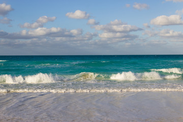 Small waves hitting the beach in Cuba