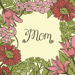 Hand lettering Mom made on floral background.