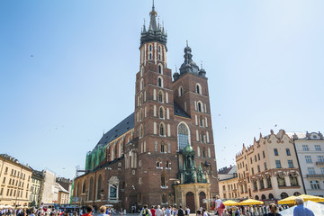 Amazing view with Saint Mary´s Church in the Rynek Glowny ,Market Main Square in Krakov, Poland,...