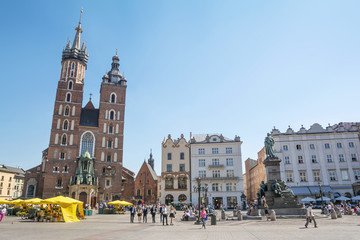 Amazing view with Saint Mary´s Church in the Rynek Glowny ,Market Main Square in Krakov, Poland,...