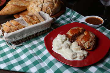 Italian dinner with breads, water and wine, table tidy