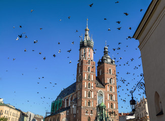 Amazing view with Saint Mary´s Church in the Rynek Glowny ,Market Main Square in Krakov, Poland, Europe - obrazy, fototapety, plakaty