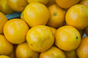 oranges fruit on market stall,with chinese new year background, in market,selective focus.